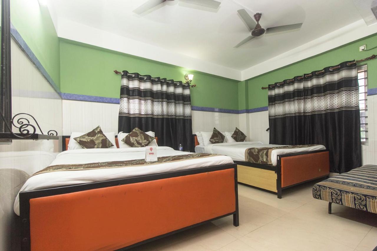 Oyo 16064 Tirupati Lodge Силигури Екстериор снимка